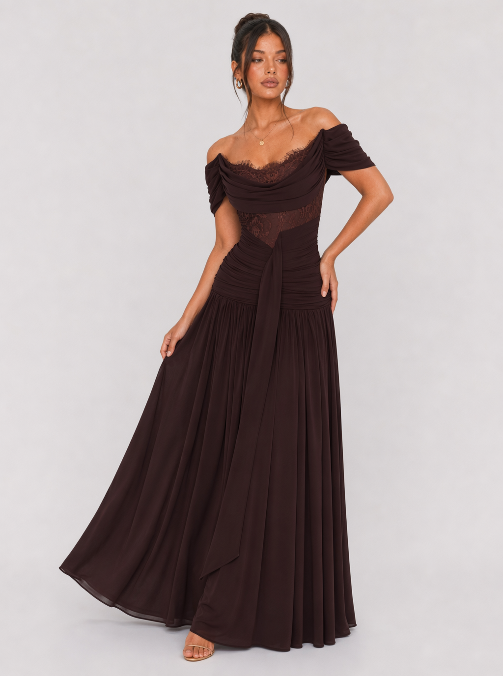 Brown off-shoulder maxi dress showing the full flowing skirt