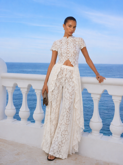 White lace wide-leg set worn outdoors on a terrace