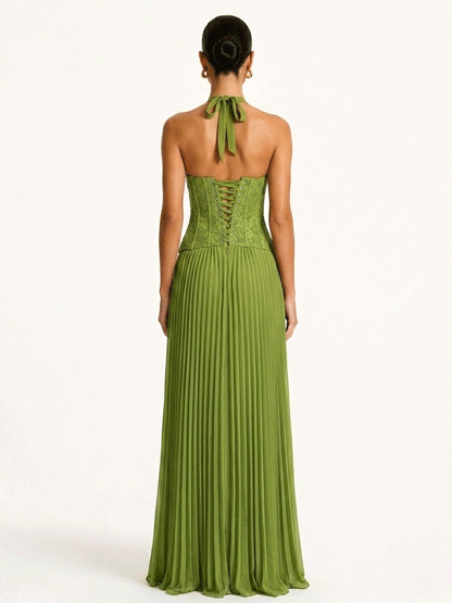 Back view of the green halter gown showing the open back